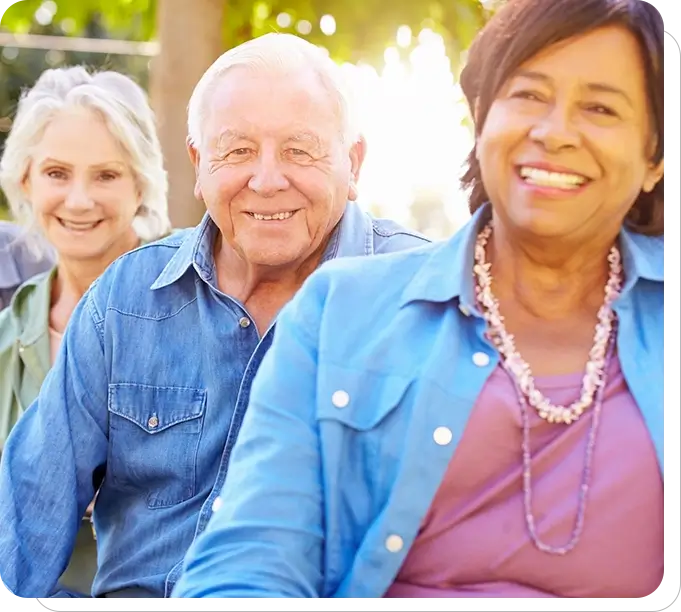 A group of people sitting next to each other.